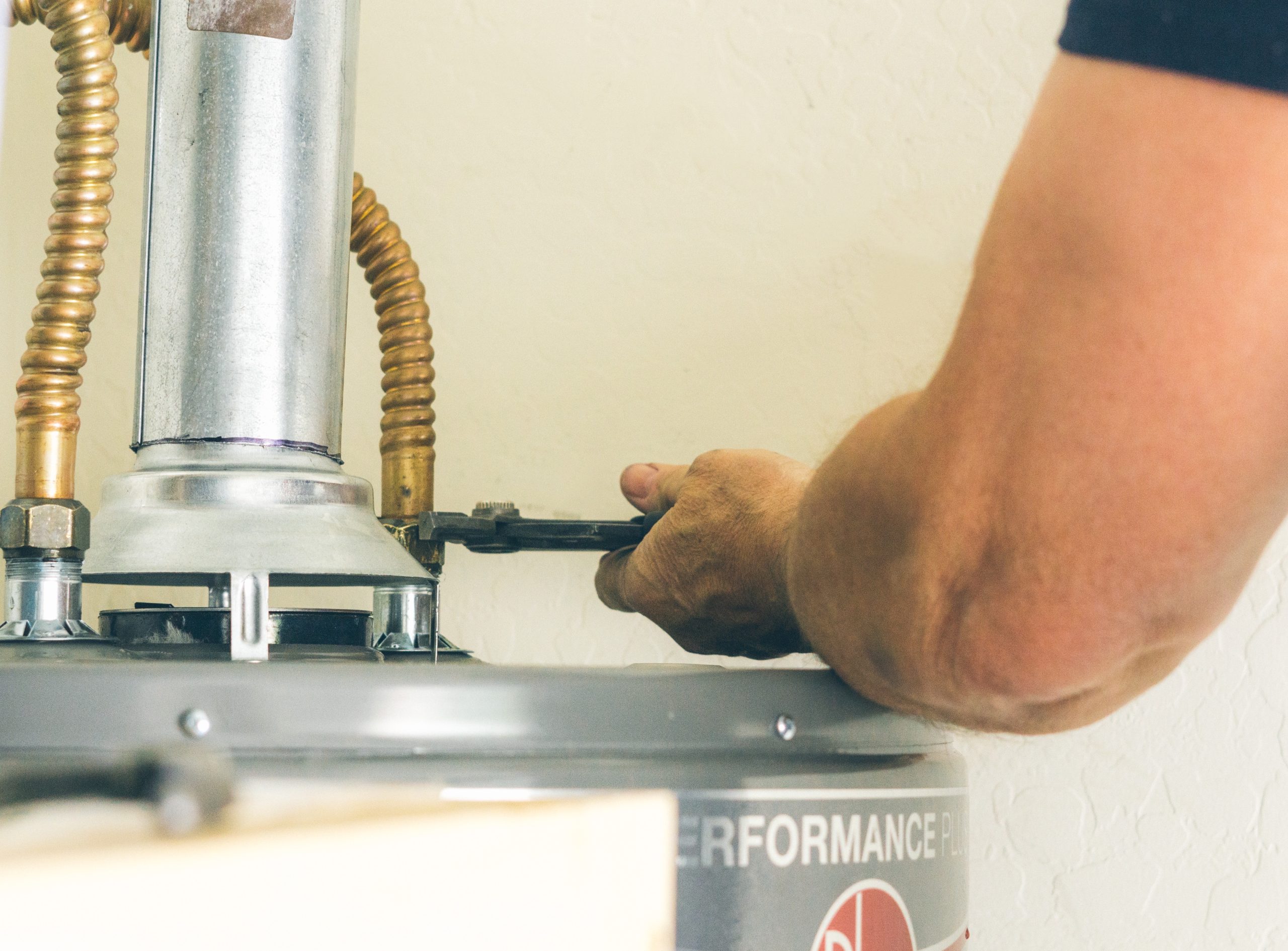 Close up of plumbing repair with silver pipes