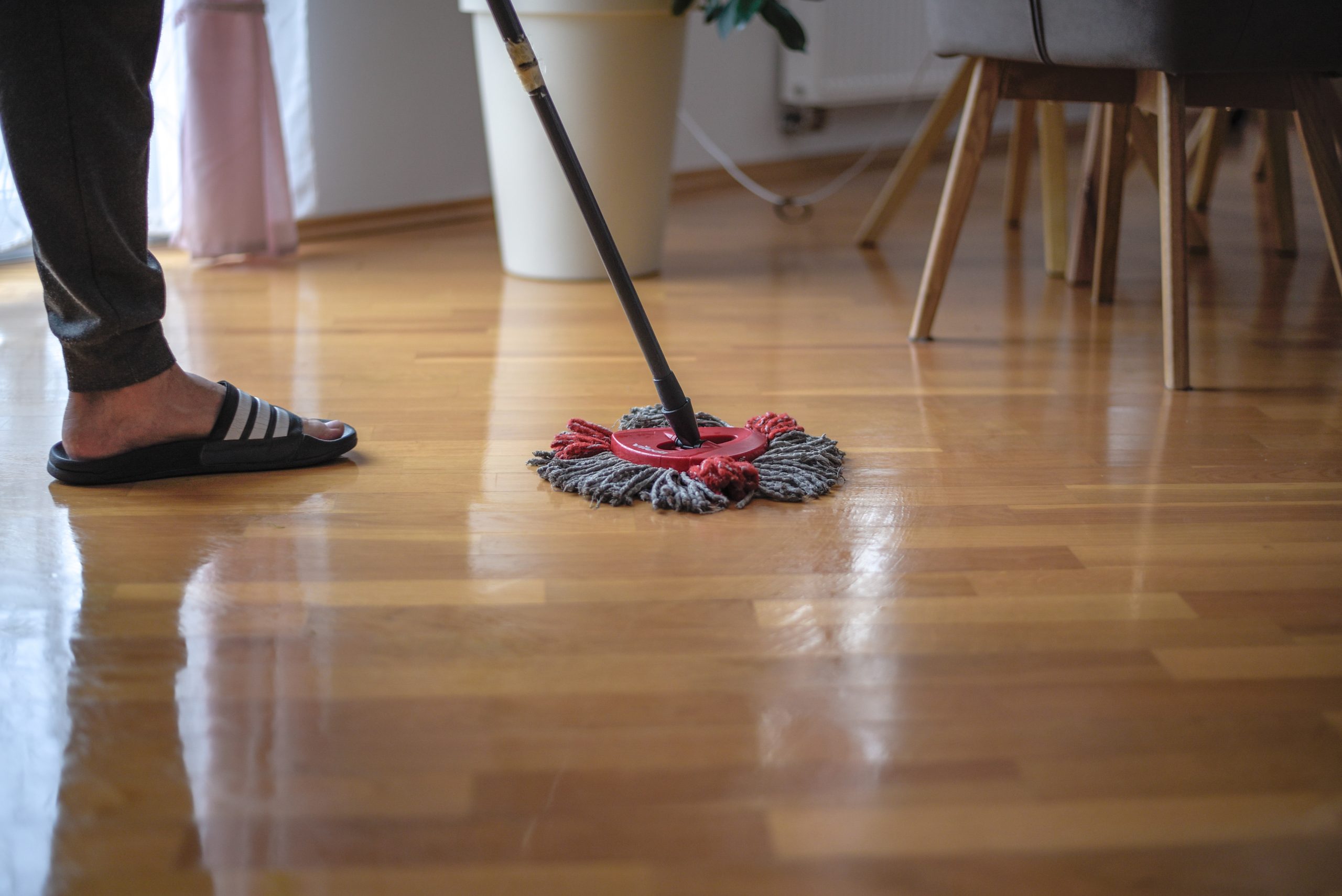 Maintaining cleanliness with a mop in a home