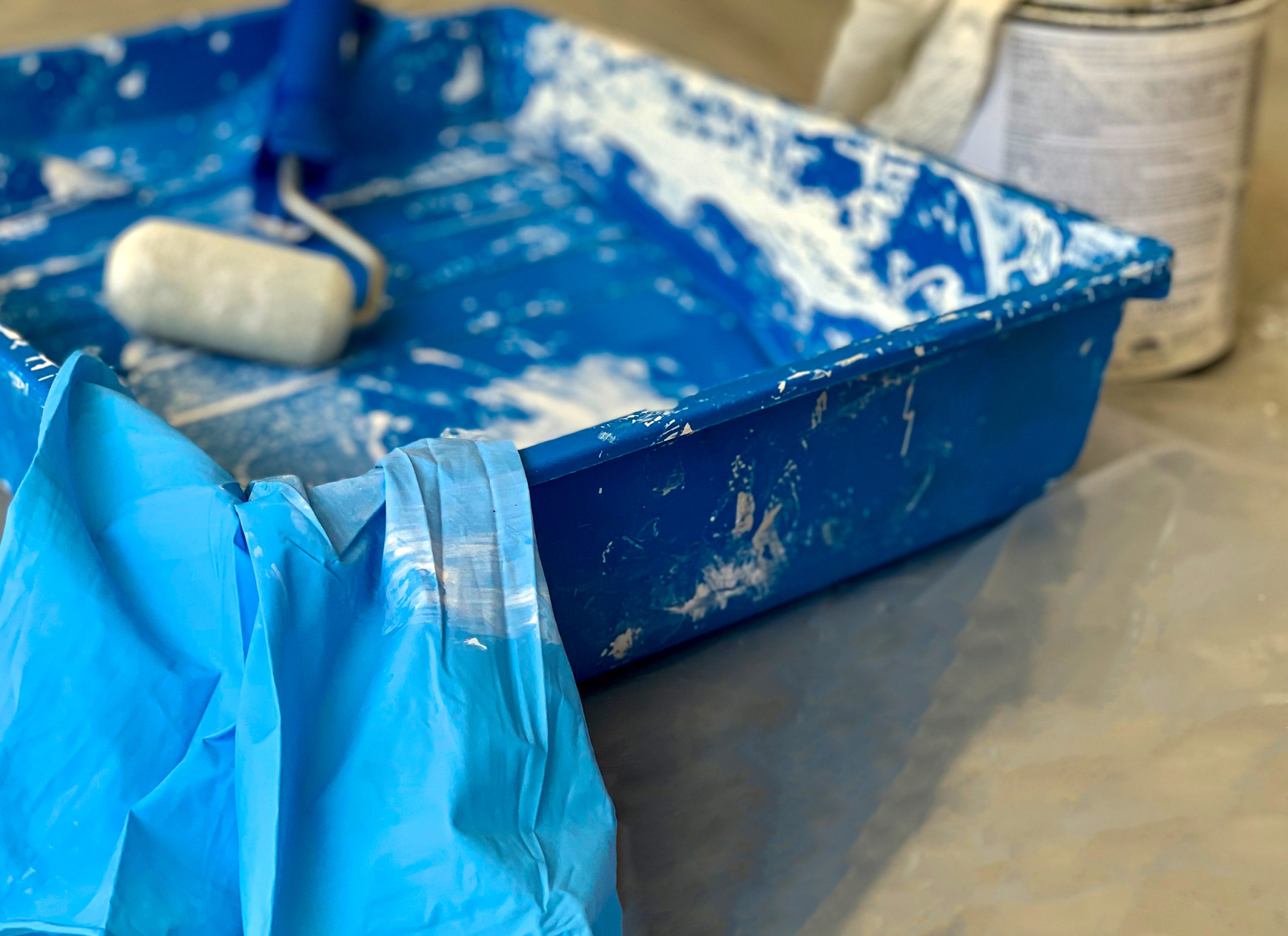 Paint tray with blue paint and painting tools