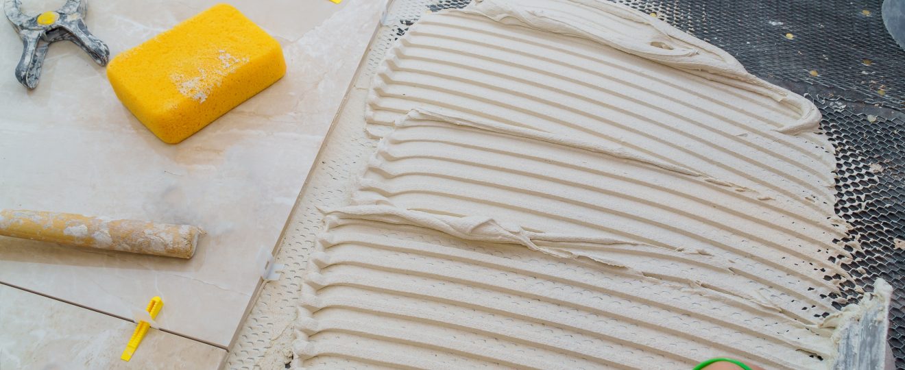 Tile installation with cement and tiling tools