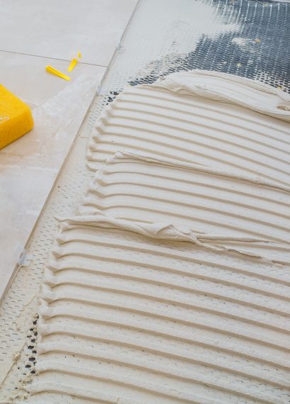 Tile installation with cement and tiling tools