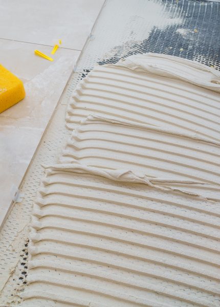 Tile installation with cement and tiling tools