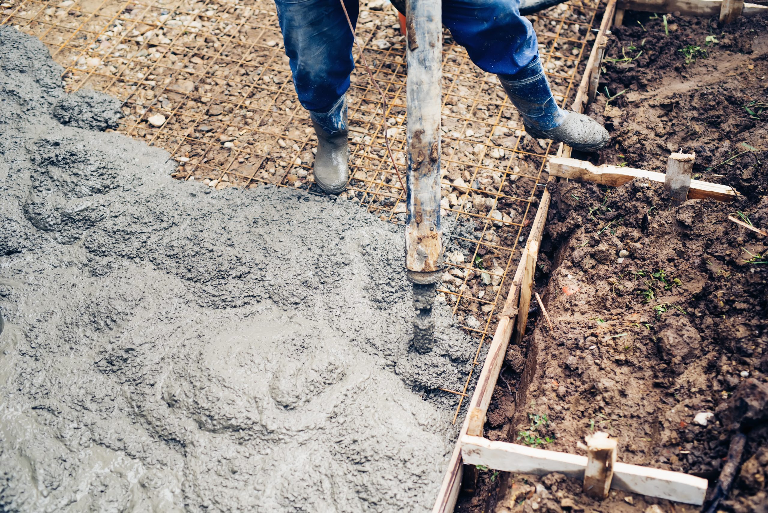 Top close up view of worker handling a massive cem